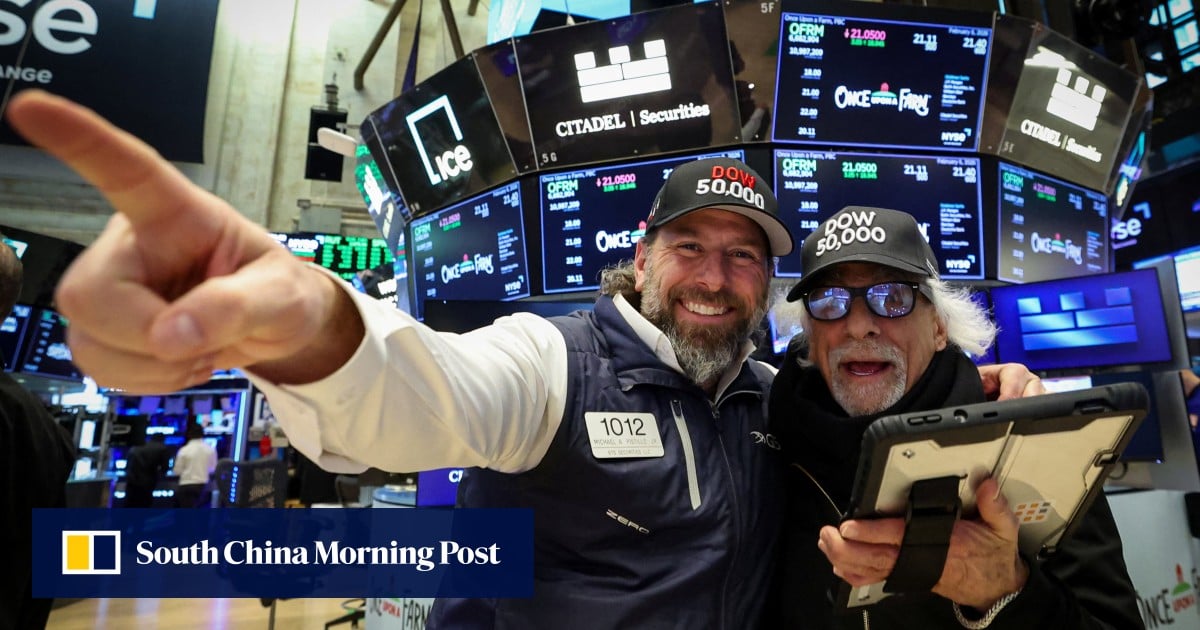 Dow breaks 50,000 for first time, as US stocks rally