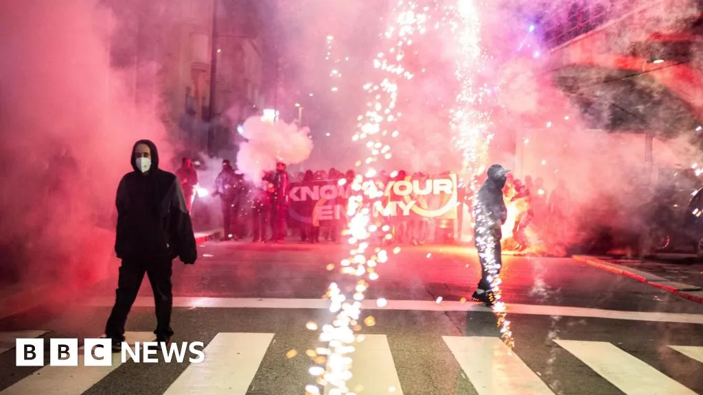Italian police arrest protesters after clash in Olympic host city Milan