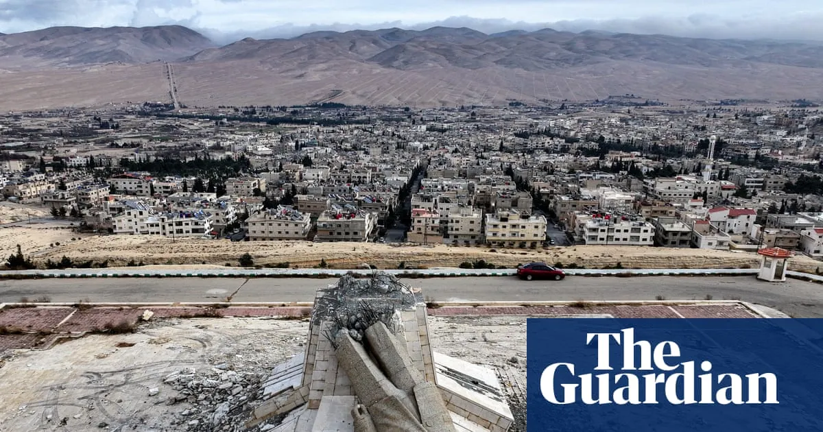 A year after fall of Assad, a divided Syria struggles to escape cycle of violence