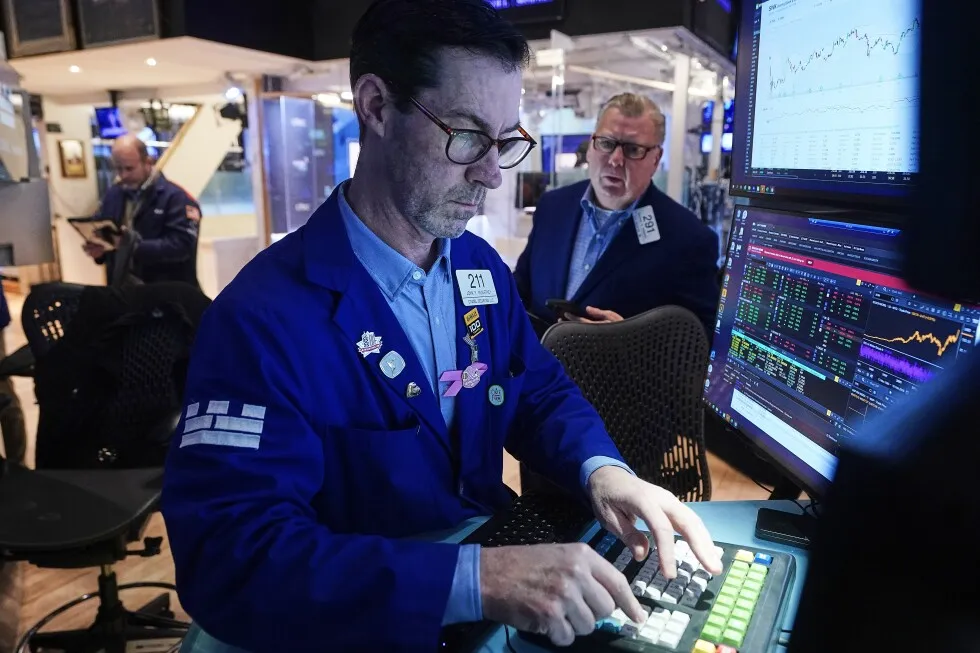 Wall Street rises to record levels after report showing the jobless rate improved last month