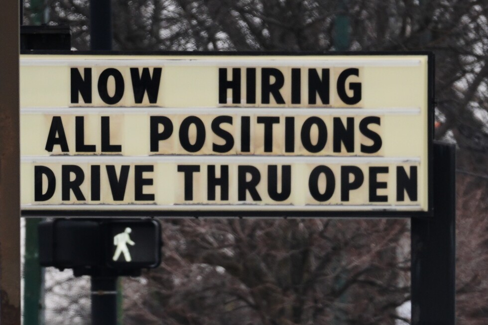 US employers add surprising 130,000 jobs last month, but revisions cut thousands of 2024-2025 jobs
