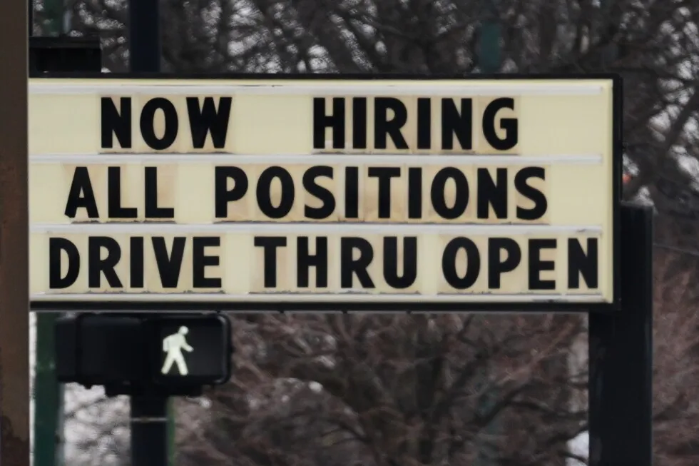 US employers add surprising 130,000 jobs last month, but revisions cut thousands of 2024-2025 jobs