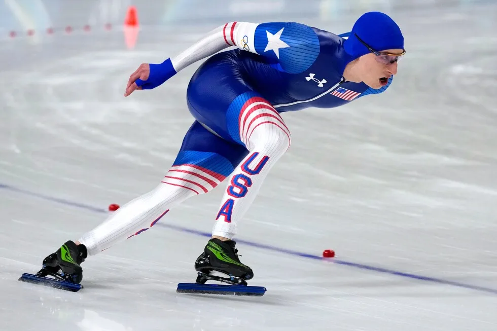 US speedskater Jordan Stolz wins the 1,000 meters gold in an Olympic-record time