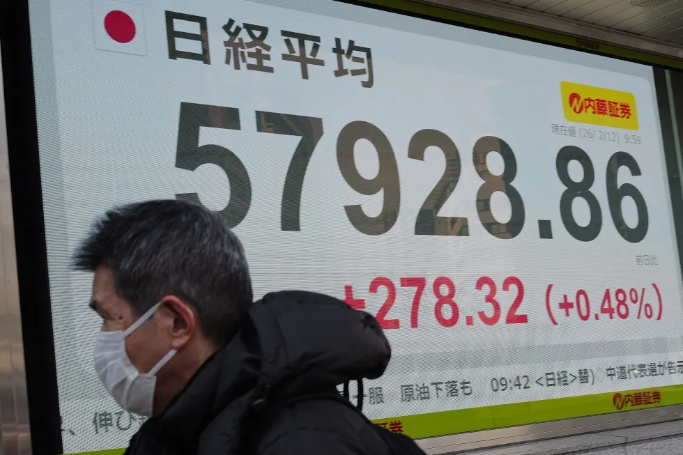 Asia shares mostly gain after Wall Street wobbled over strong jobs report
