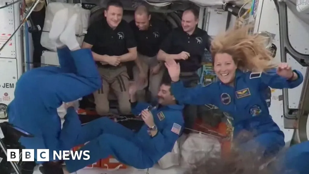 Watch: Moment crew docks at International Space Station