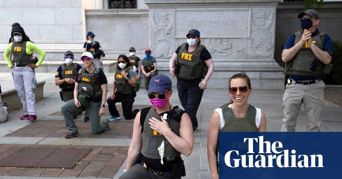 FBI agents fired for kneeling at racial justice protest sue to win jobs back