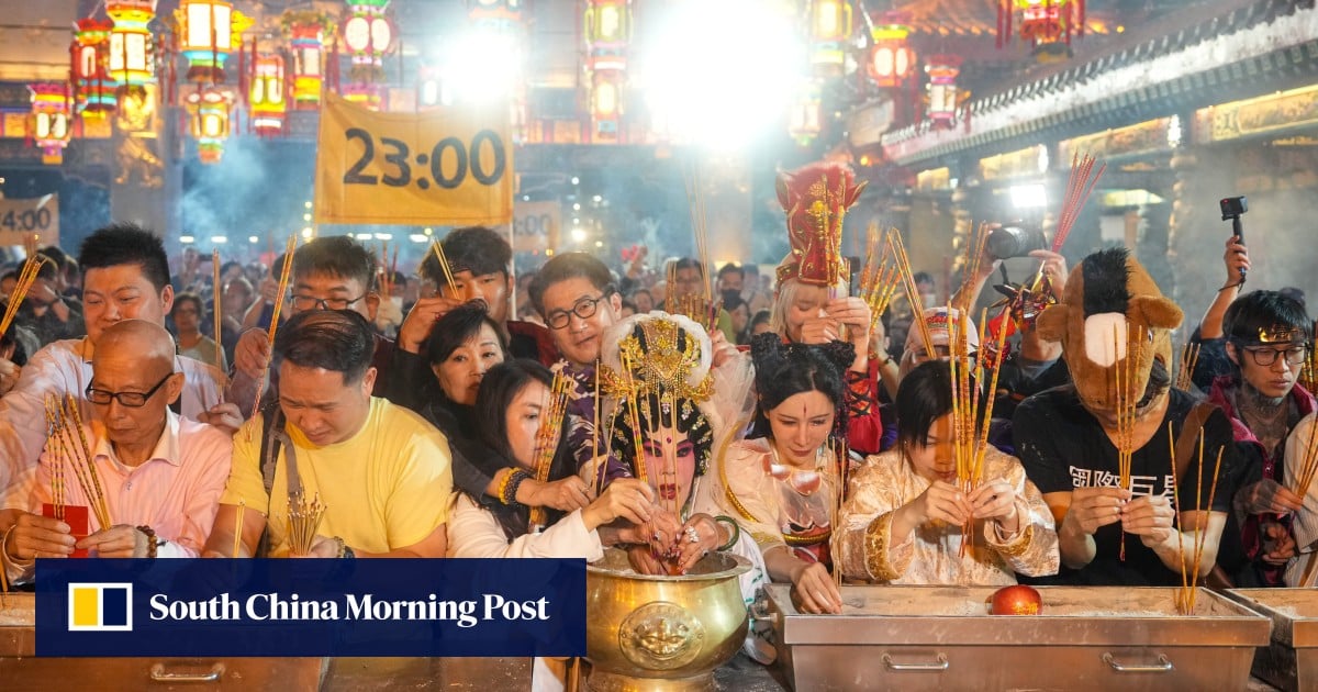Thousands flock to Hong Kong temple for Lunar New Year incense stick ritual
