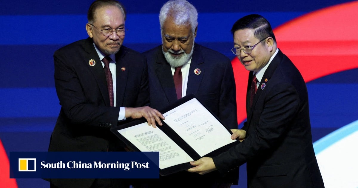 ‘This is history’: tears as East Timor completes journey into Asean