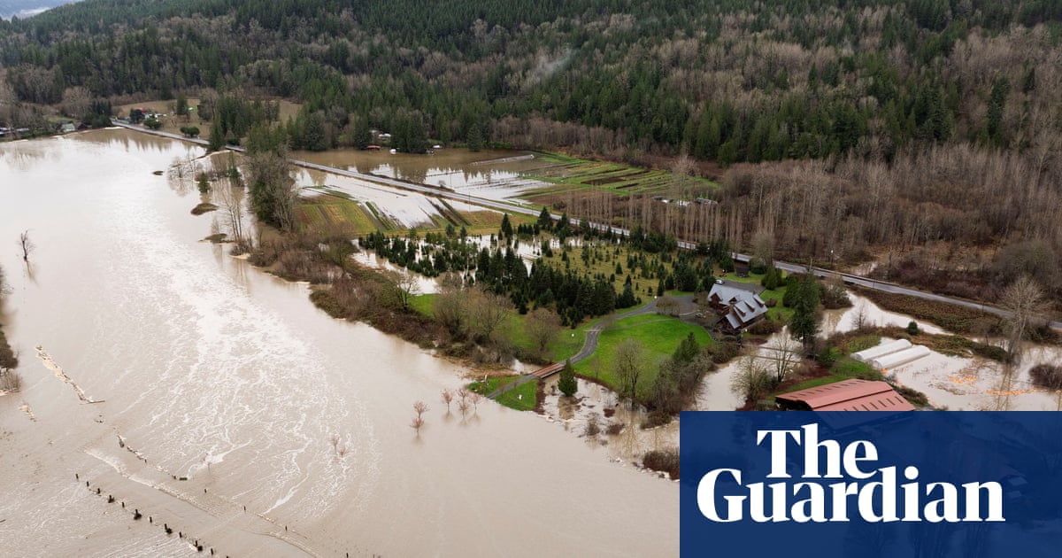 Powerful storms dump heavy rain and swell rivers across US Pacific north-west