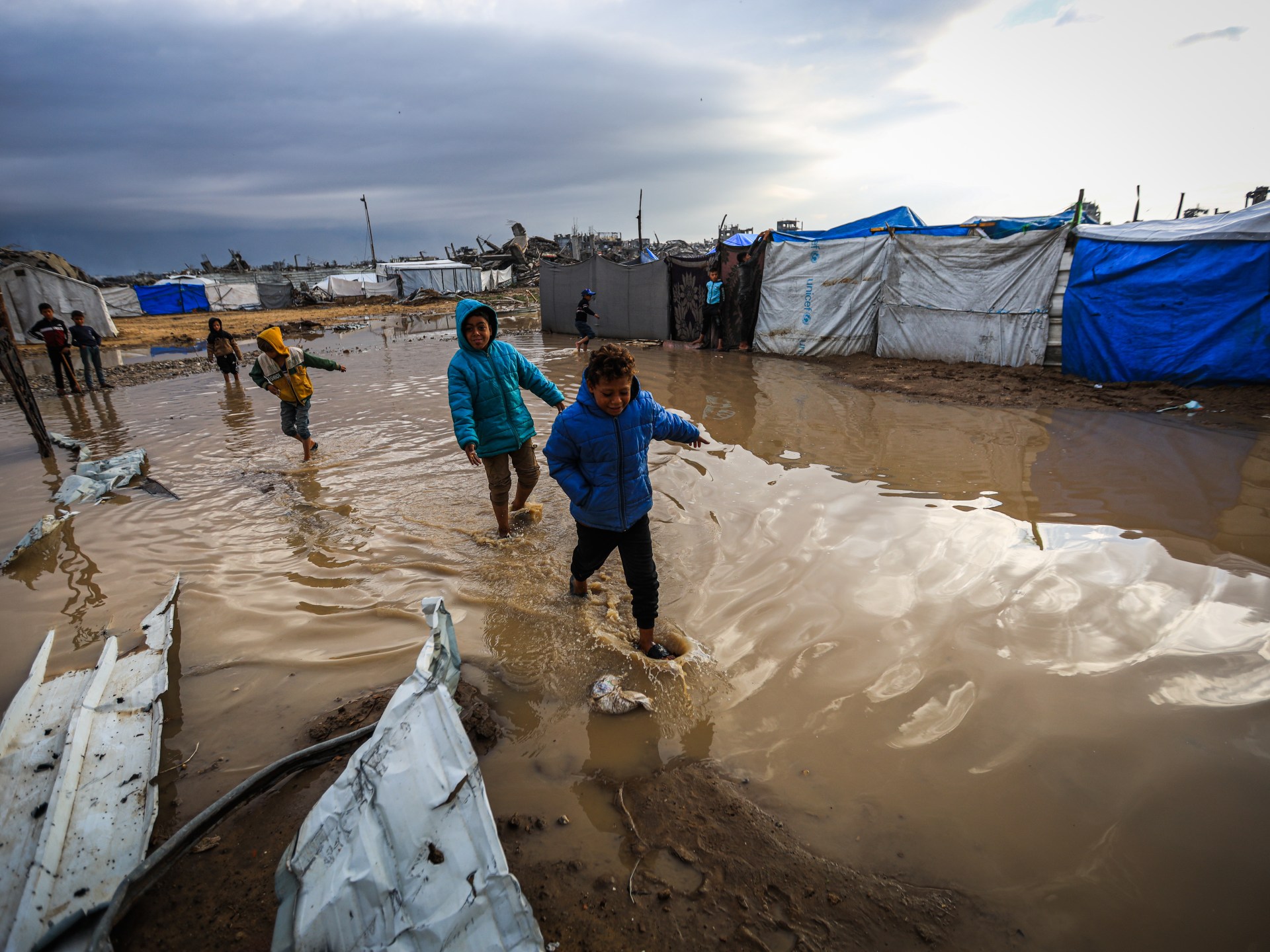 Heavy rains flood tents sheltering the displaced, heaping misery on Gaza