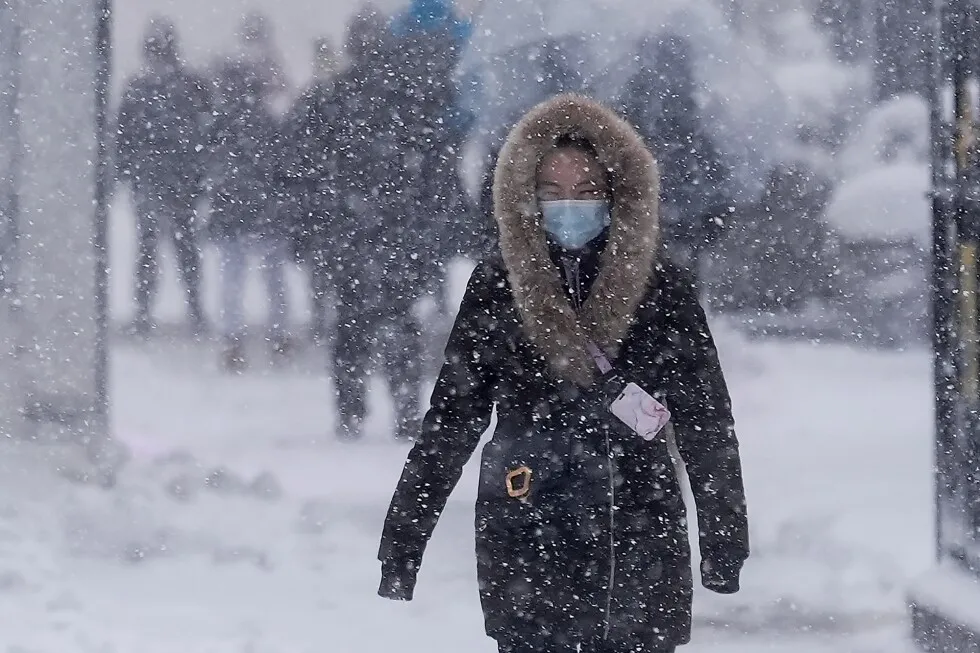 Northeast US digs out from brutal storm that disrupted flights and canceled school