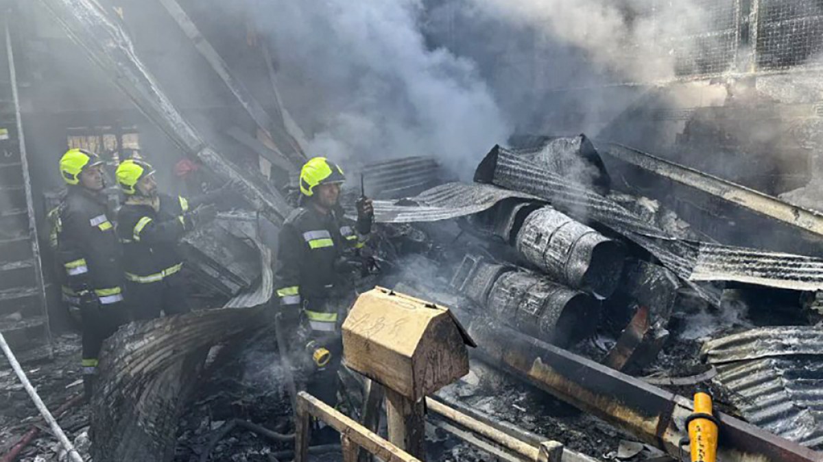 Iran army helicopter crashes into market, killing 2 pilots and 2 merchants