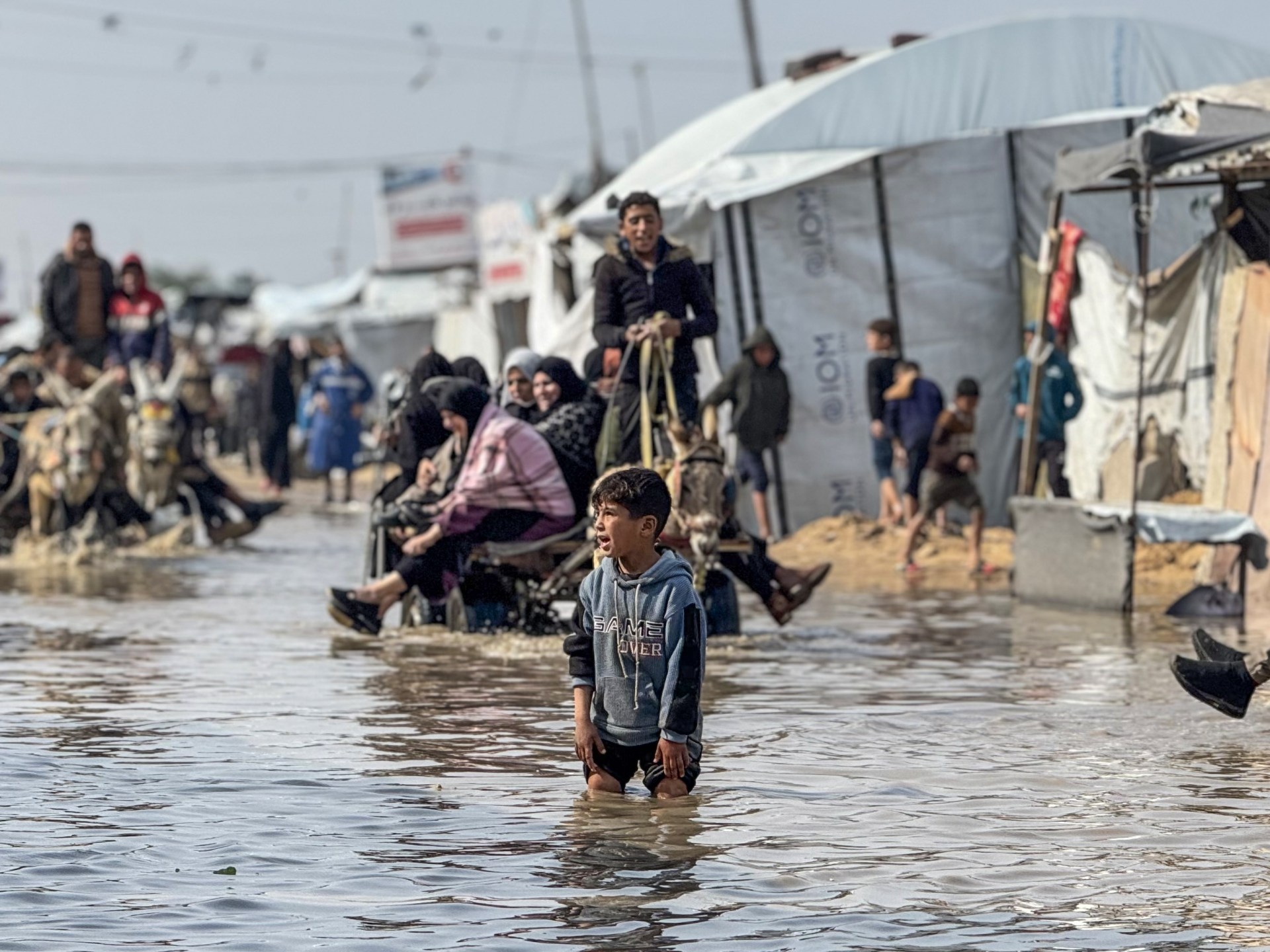 Heavy rains flood Gaza tents as Israel kills two more Palestinians