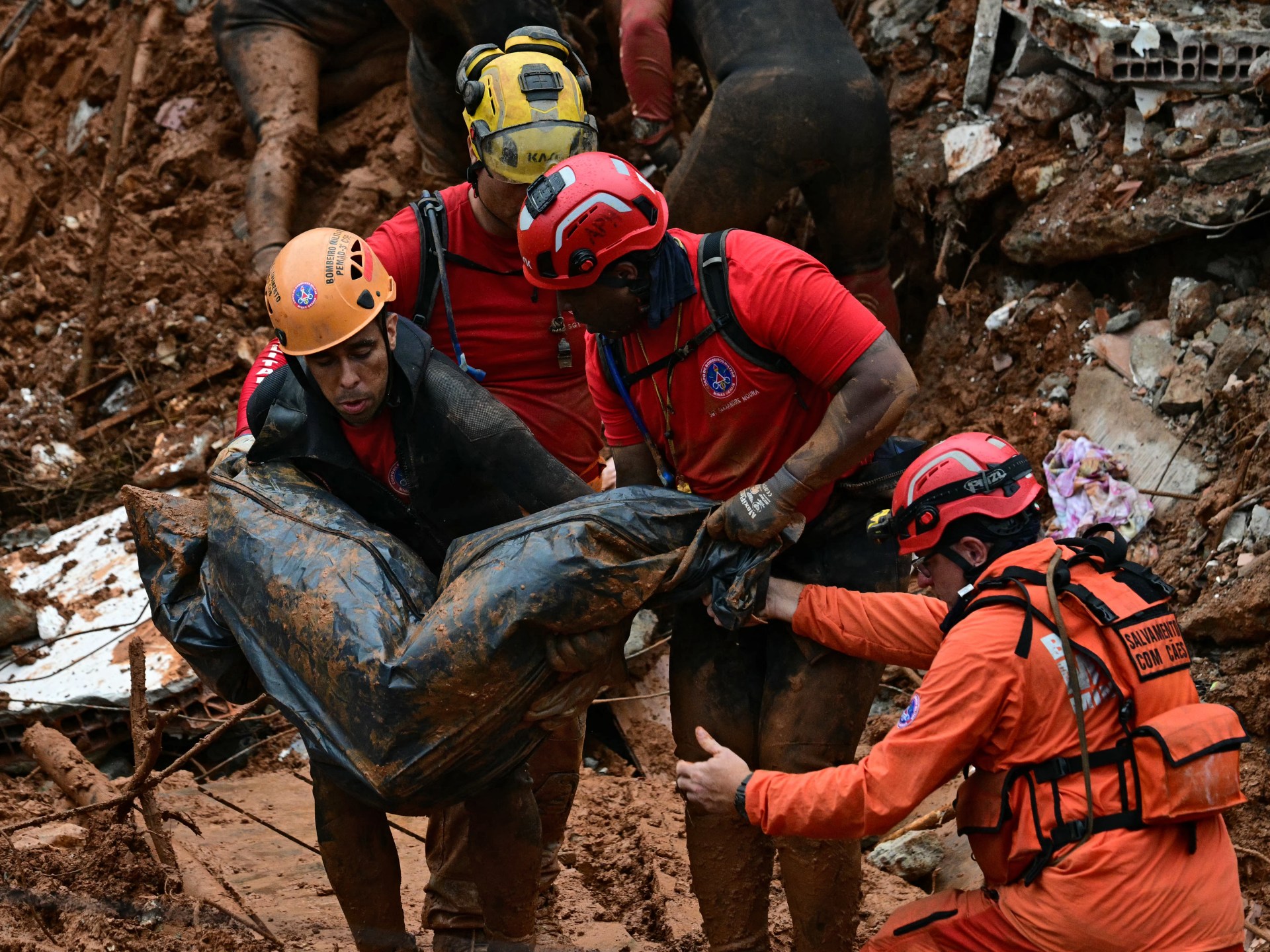 Rescuers search for missing after storm deluge kills 30 in Brazil