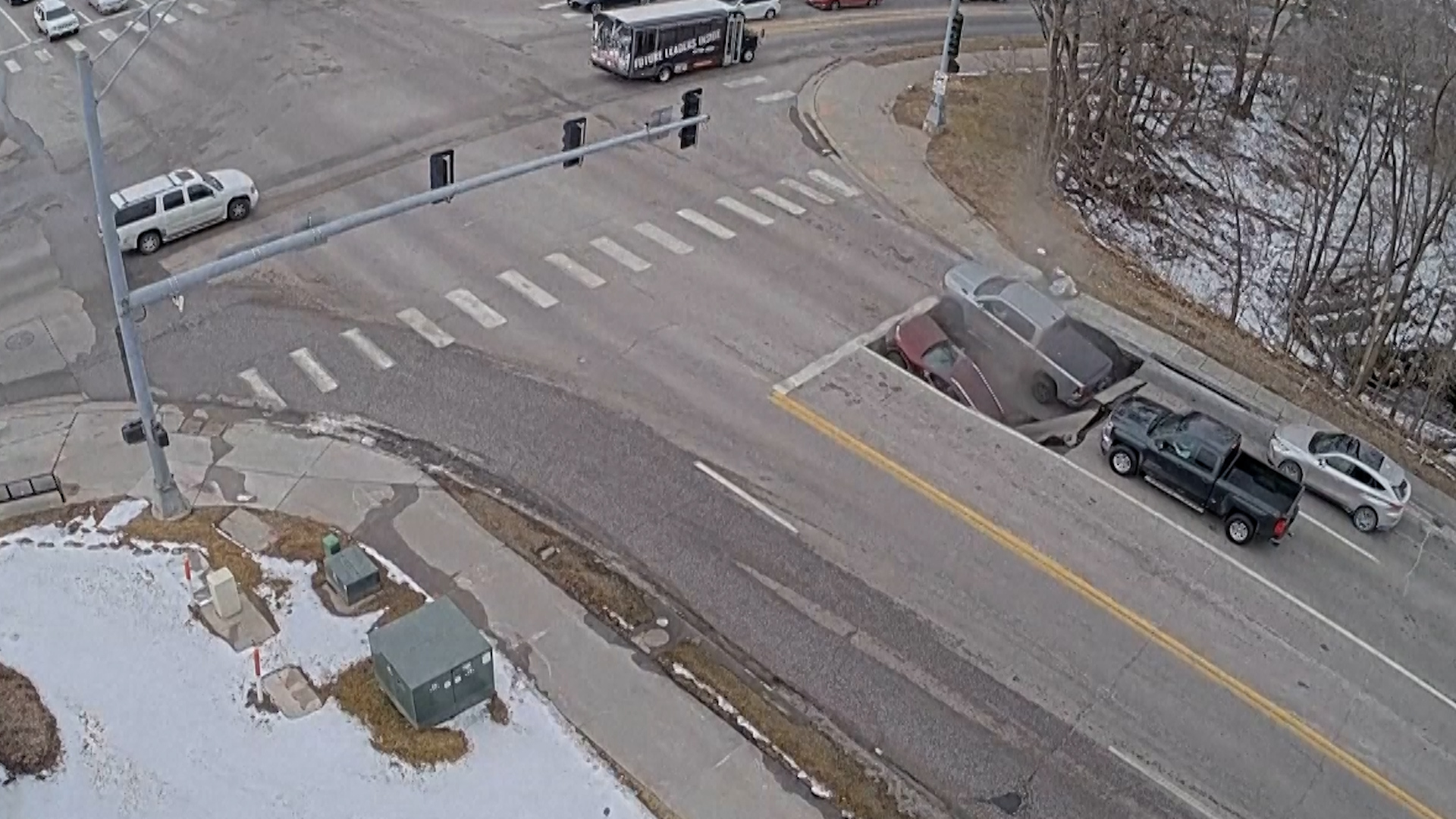 Massive sinkhole swallows two cars in Nebraska