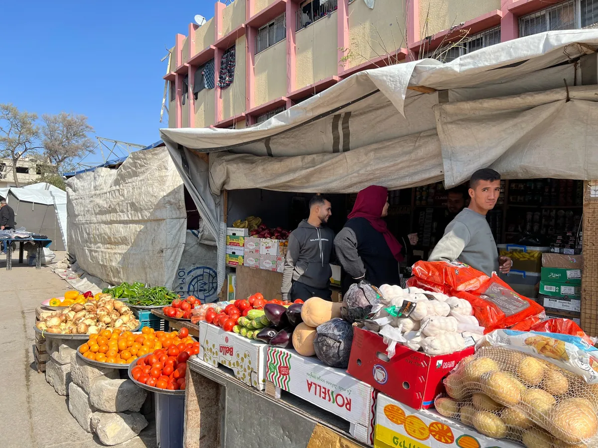 In Gaza, when money is scarce, every choice counts: Bank, cash, or credit?