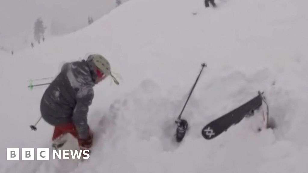 Watch dramatic rescue of skier buried in deep snow