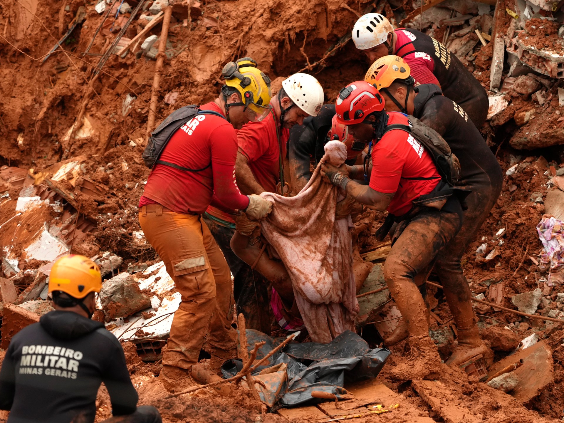 Brazil flooding death toll rises to 64 as search efforts continue