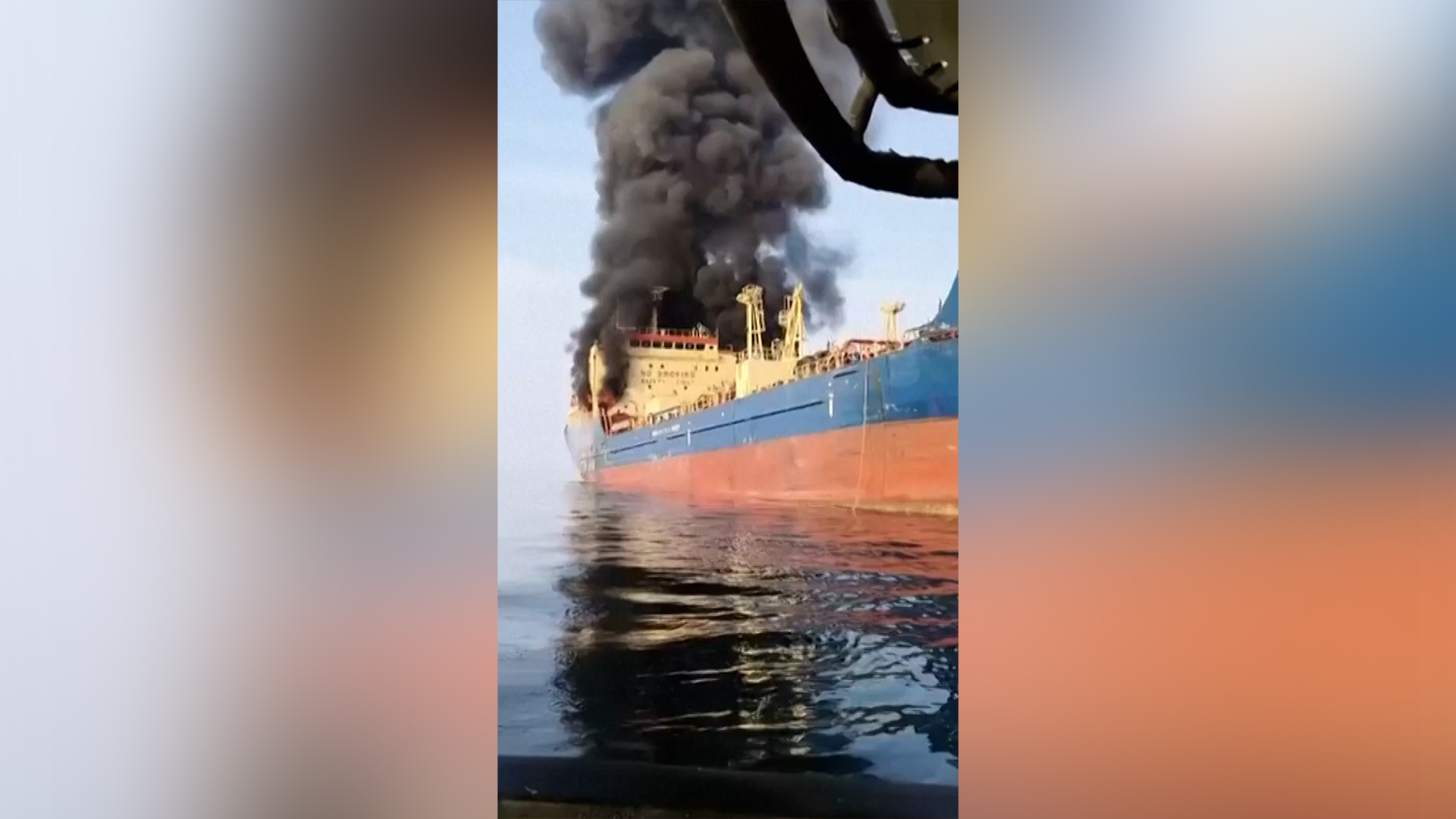Black smoke pours from oil tanker near Strait of Hormuz