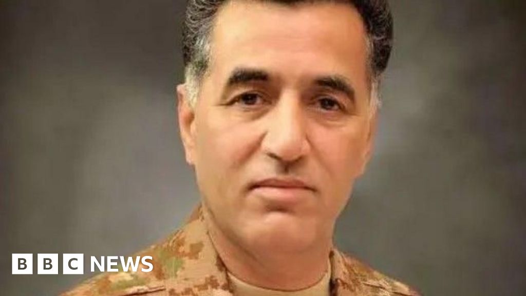 Pakistan's military sentences its former spy chief to 14 years in jail 