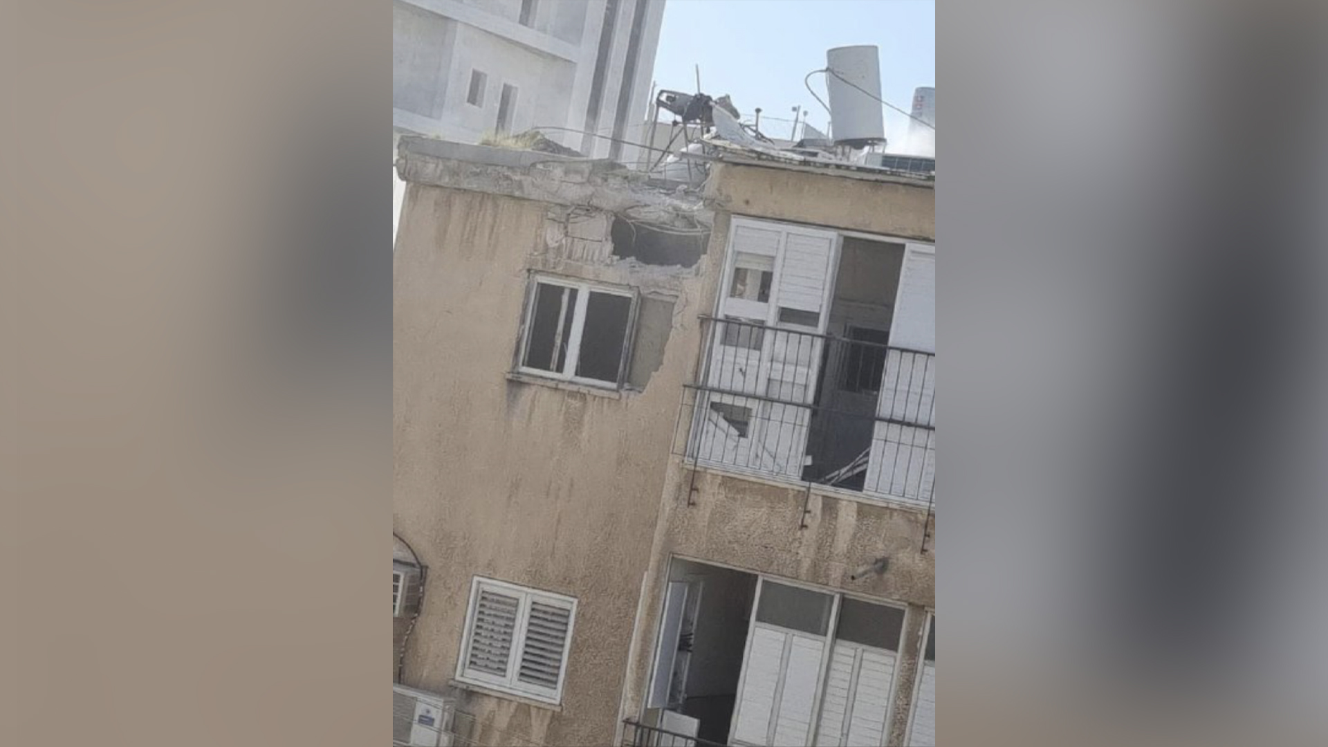 Video shows effects of debris falling on a building in Tel Aviv