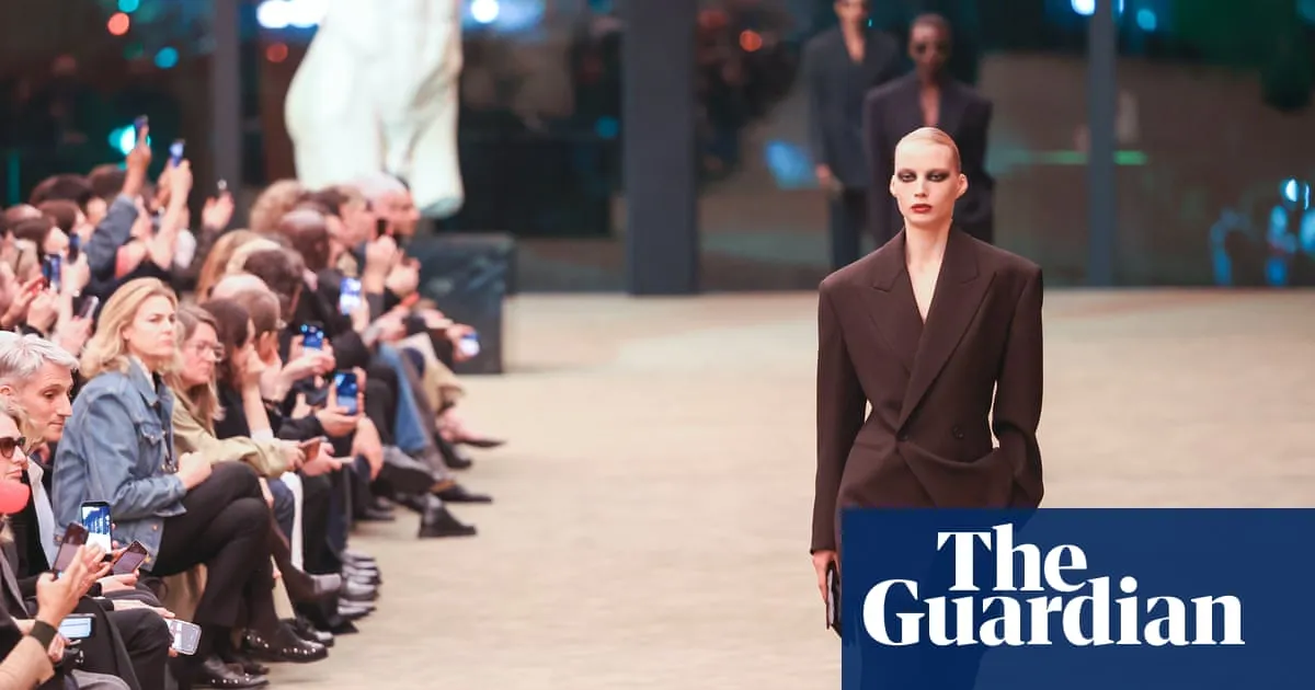 YSL lights up Paris fashion week show with return of Le Smoking suit