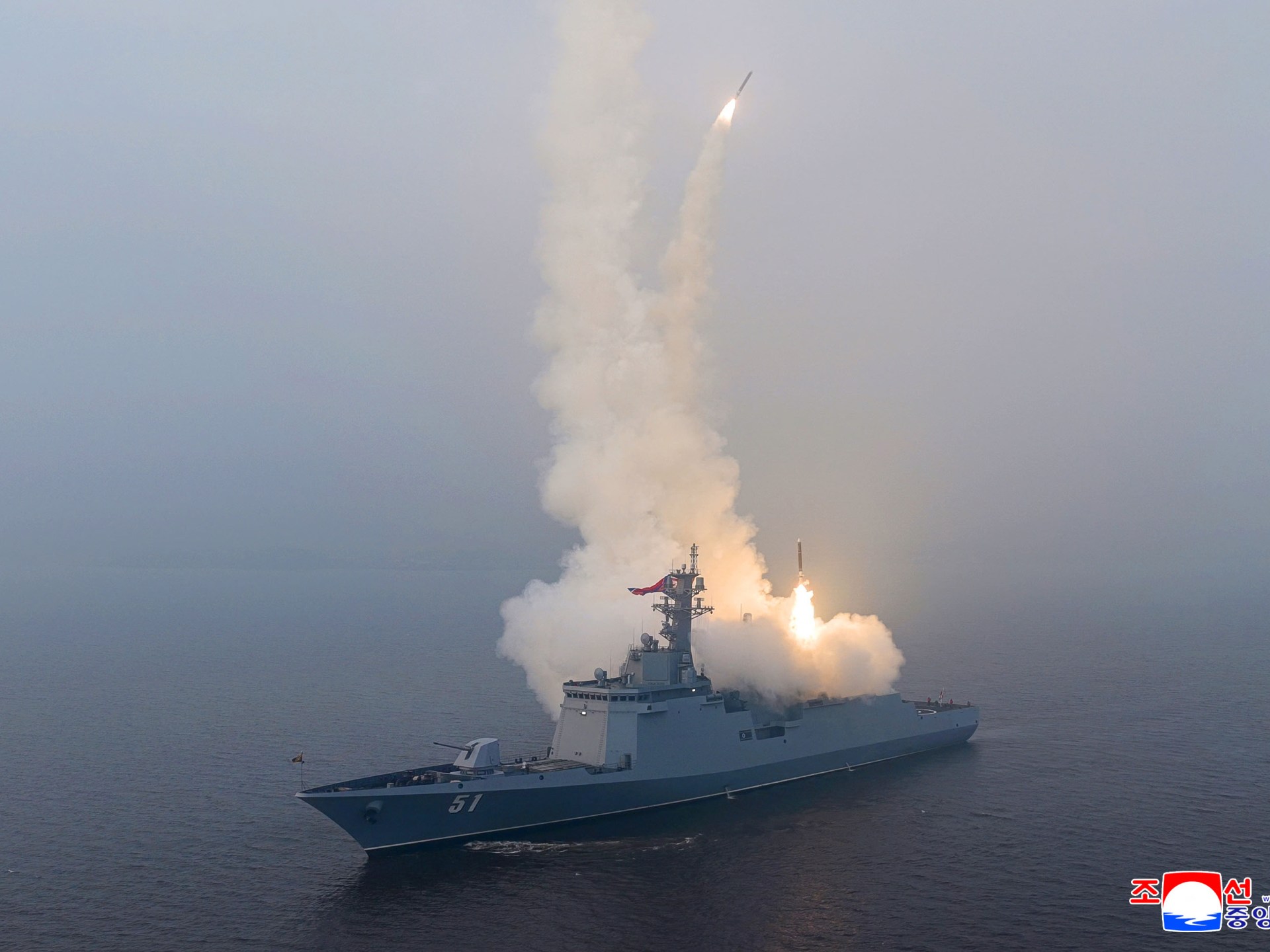 North Korea’s Kim oversees cruise missile tests from new naval destroyer