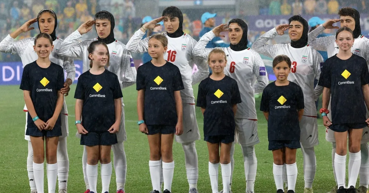 Iran women’s football team salute, sing national anthem in Asian Cup match