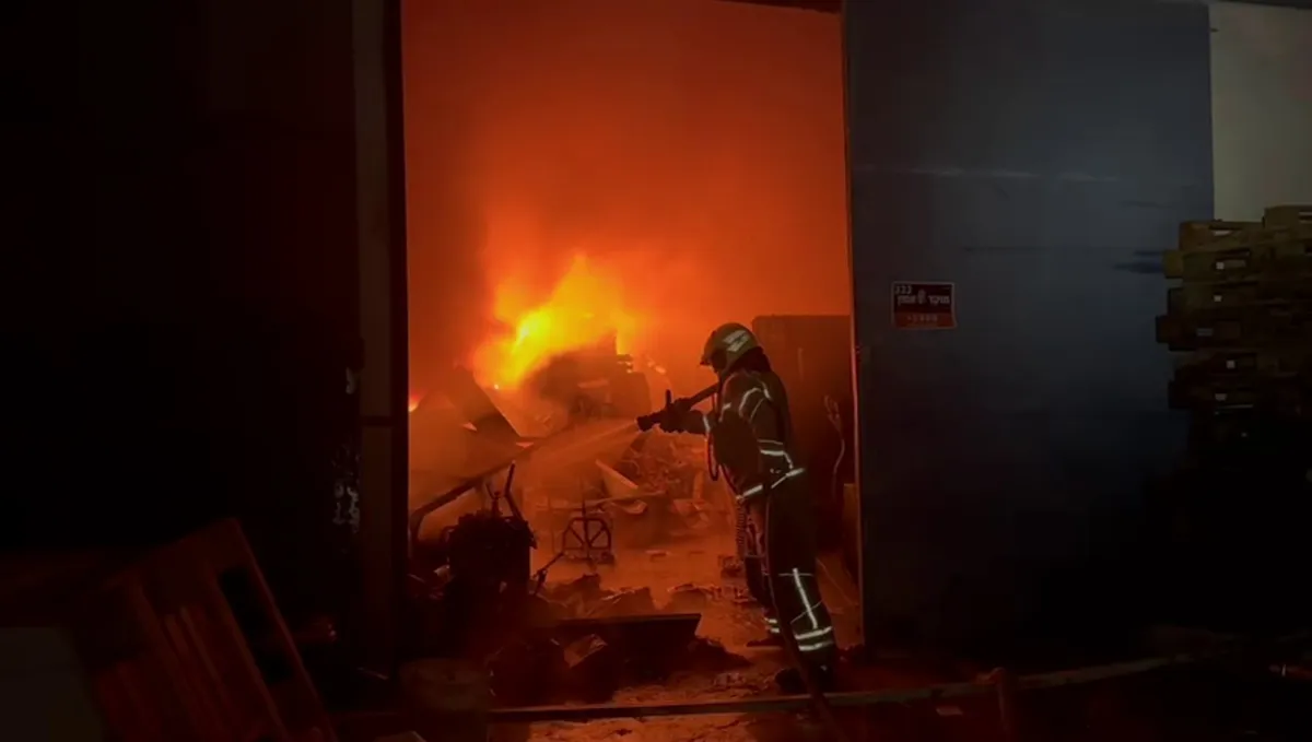 Suspected Iranian missile debris ignites fires in central Israel