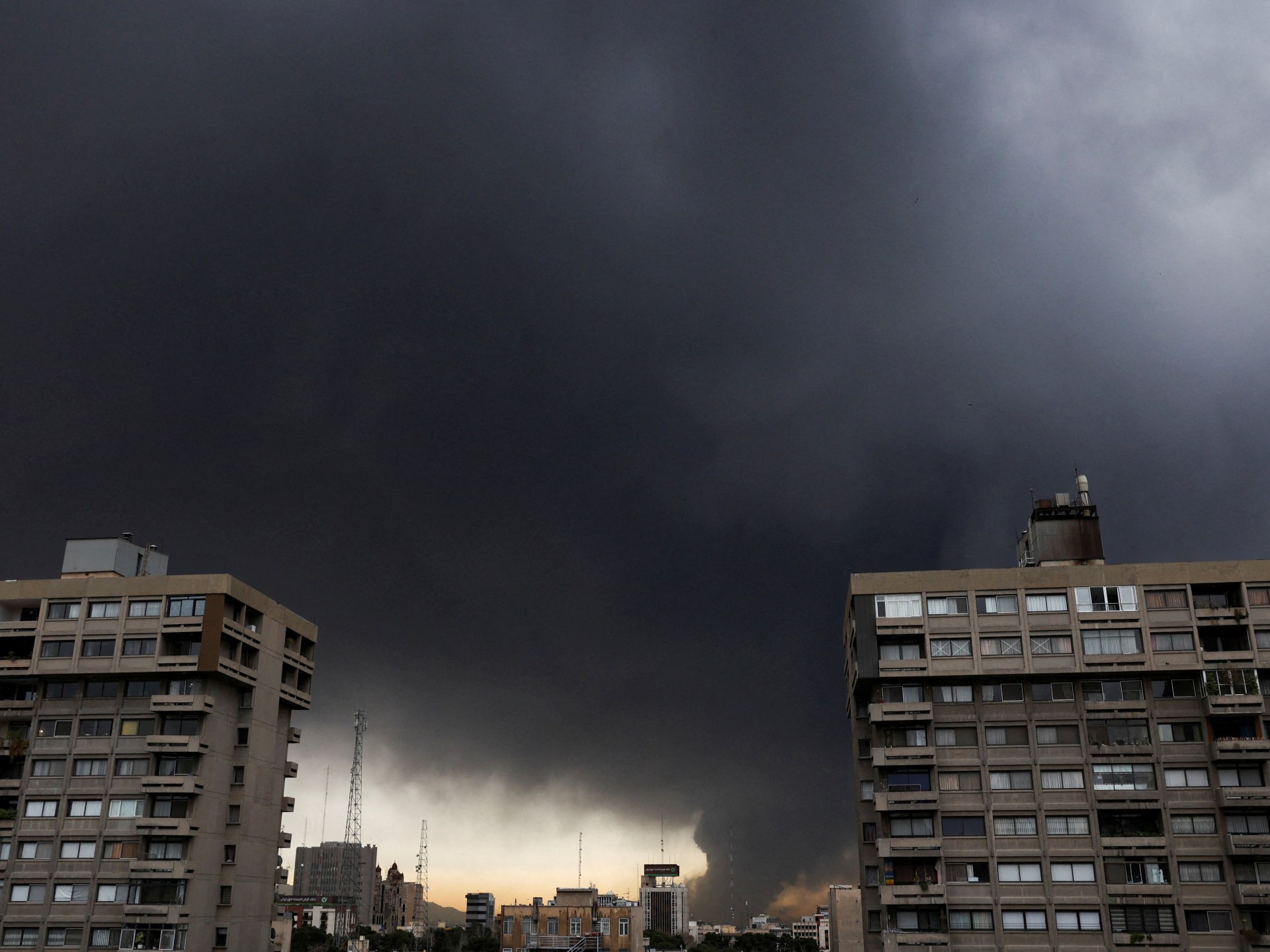 Dark haze over Tehran as US-Israeli forces bomb oil storage facilities