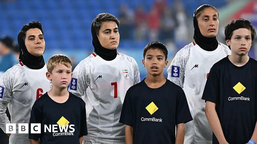 Australia urged to protect Iranian women's football team as they prepare to fly home