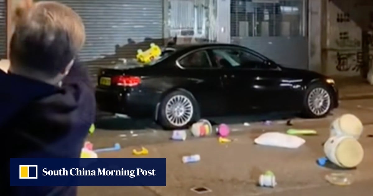 Mother in Hong Kong held after unattended son throws items from flat, damaging car