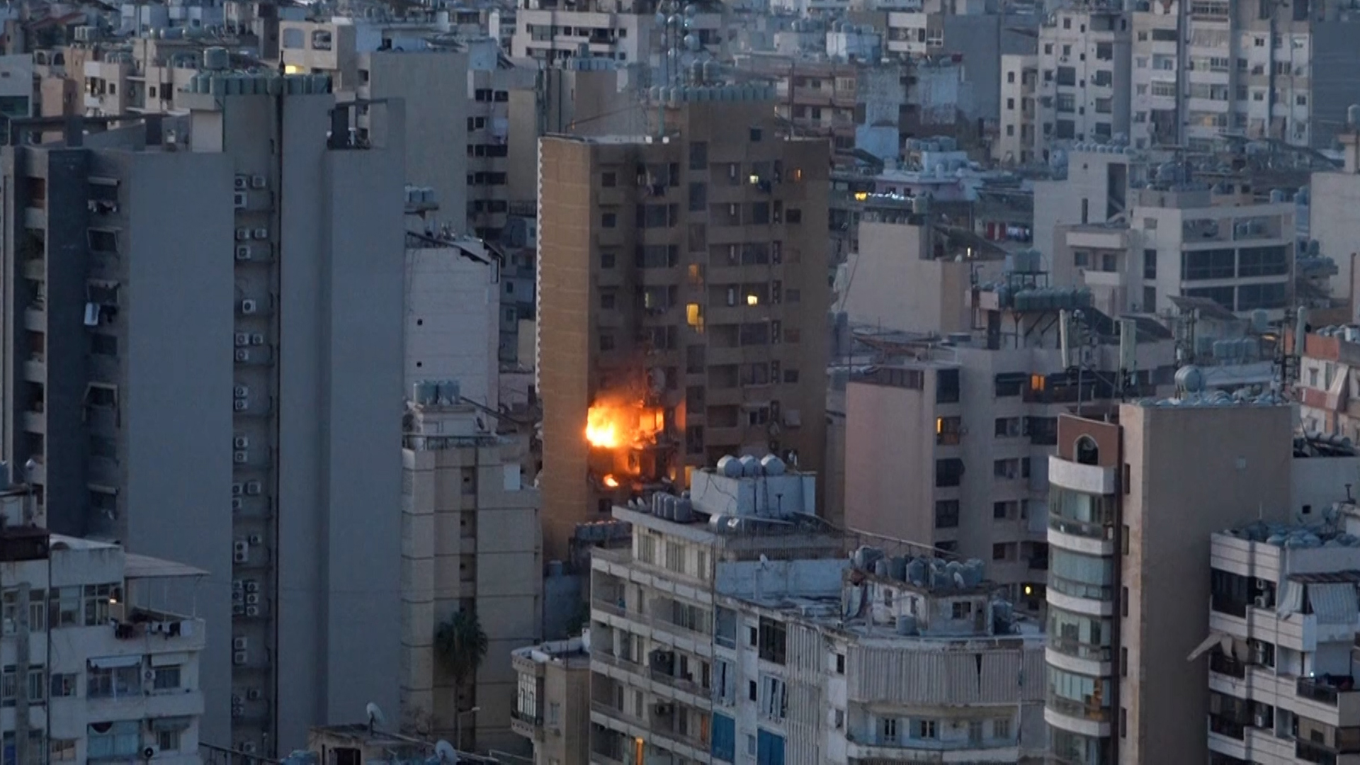 Beirut building ablaze after apparent Israeli strike