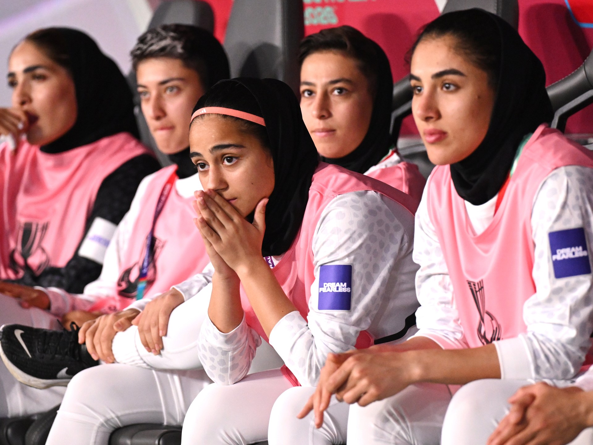 One Iranian football team member changes mind after Australia grants asylum