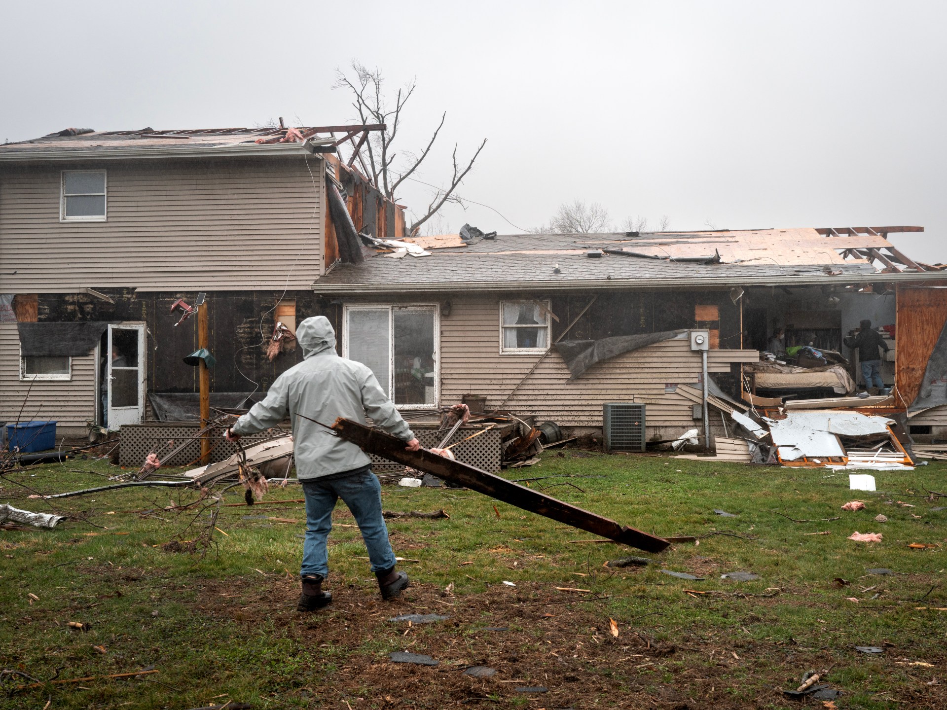Two killed as tornadoes sweep across US Midwest in latest extreme weather