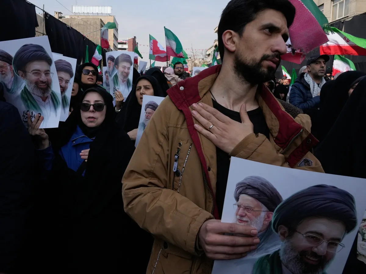 Iran’s authorities warn against protests as Israel threatens Basij forces