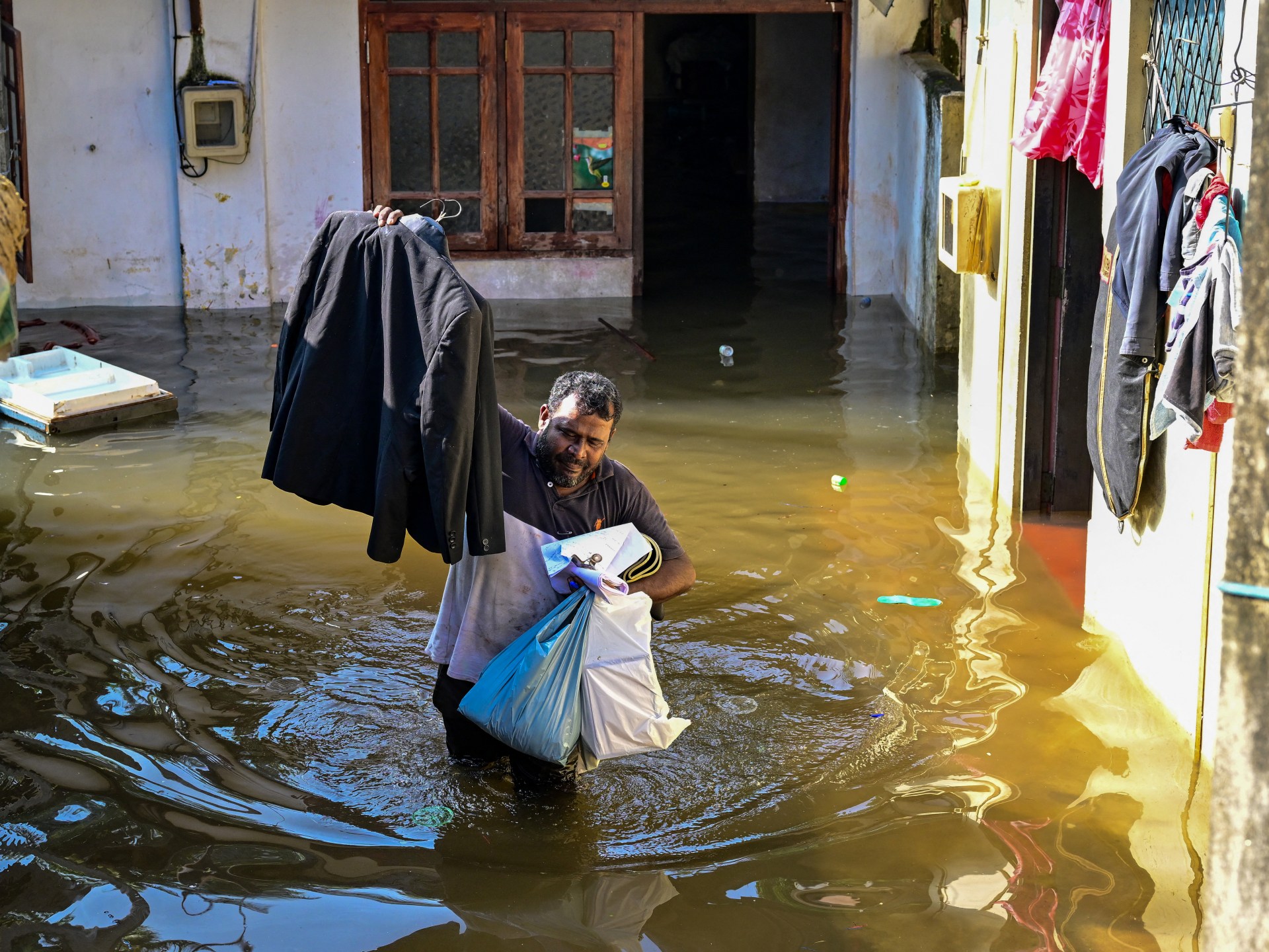 ‘Neighbourhoods buried under mud’: Sri Lanka floods death toll nears 200