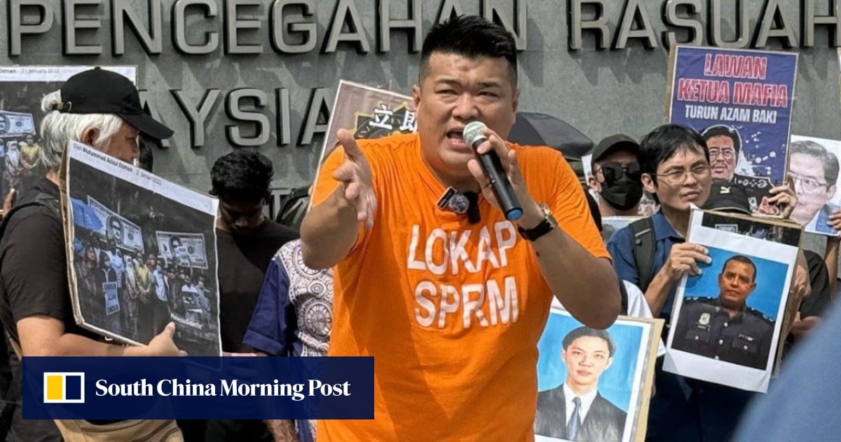 Malaysian businessman releases photo of armed officer to prove he was held at gunpoint