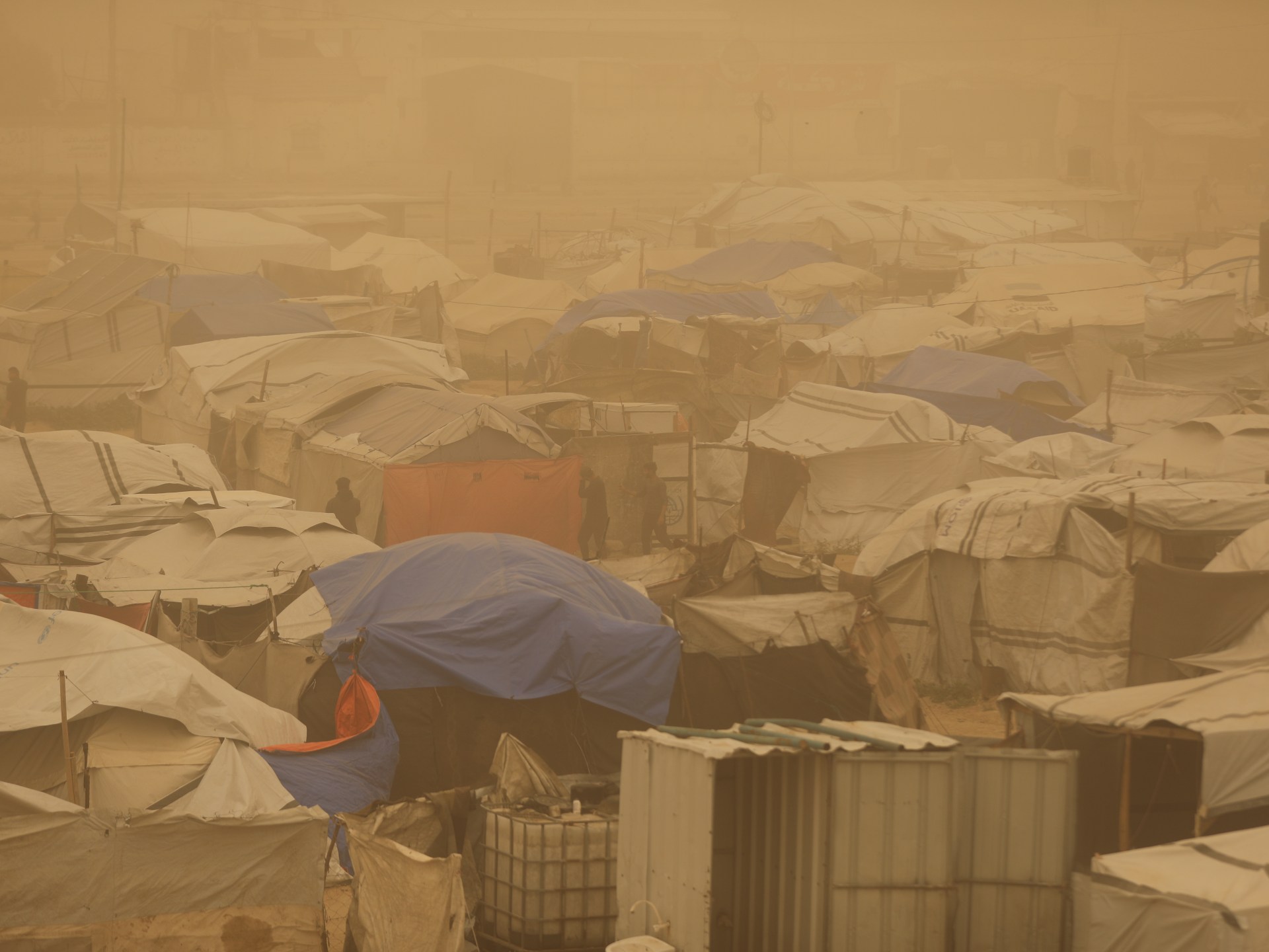 Israeli attacks kill 13 in Gaza, including 2 children and a pregnant woman