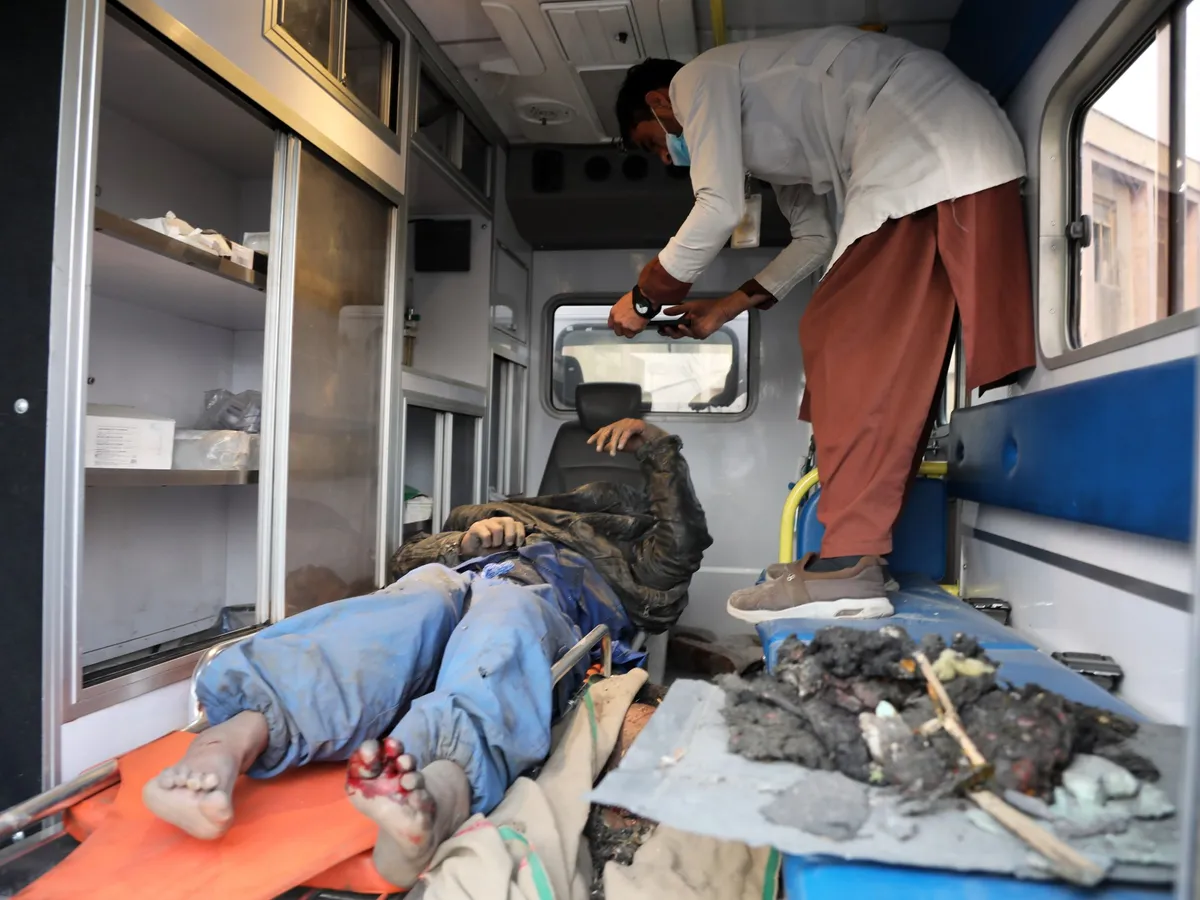 Rescue teams recover bodies after deadly Kabul hospital air strike