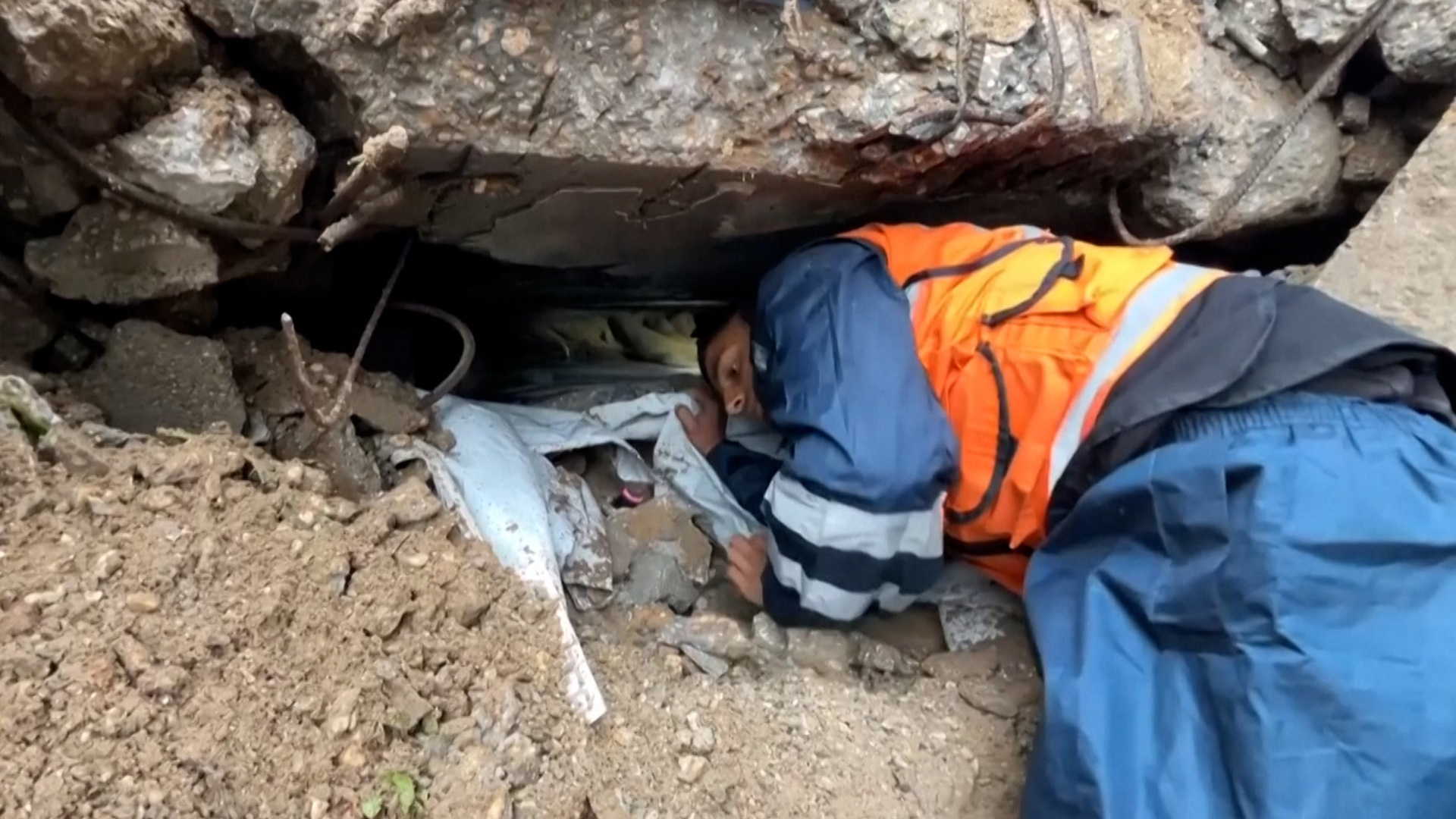 Palestinians trapped under storm-collapsed buildings in Gaza