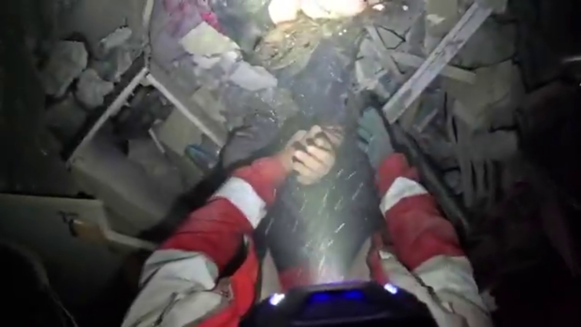 Tehran rescue workers pull survivors from rubble