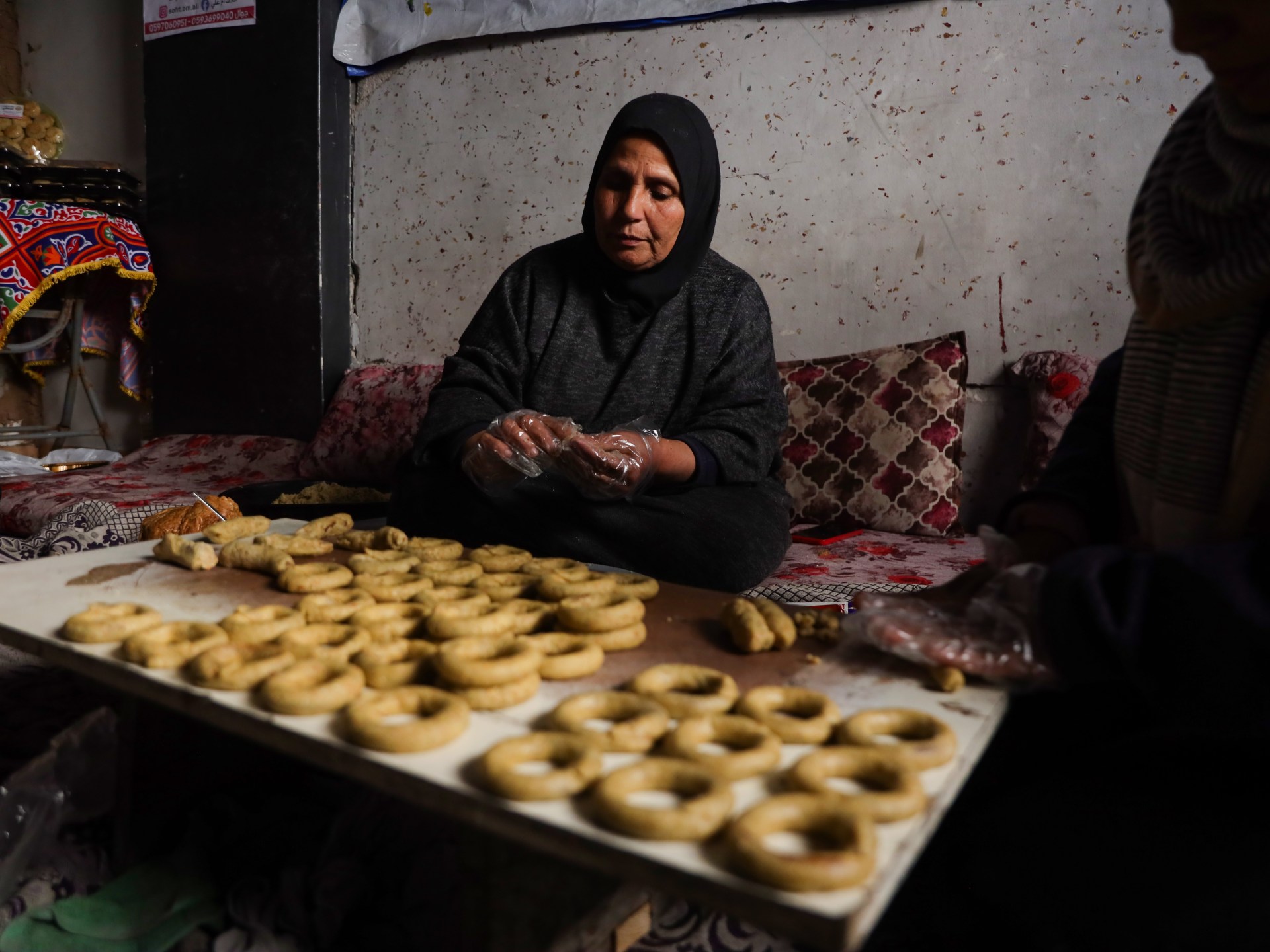 Baking in rubble: Gaza woman keeps Eid traditions alive despite shortages