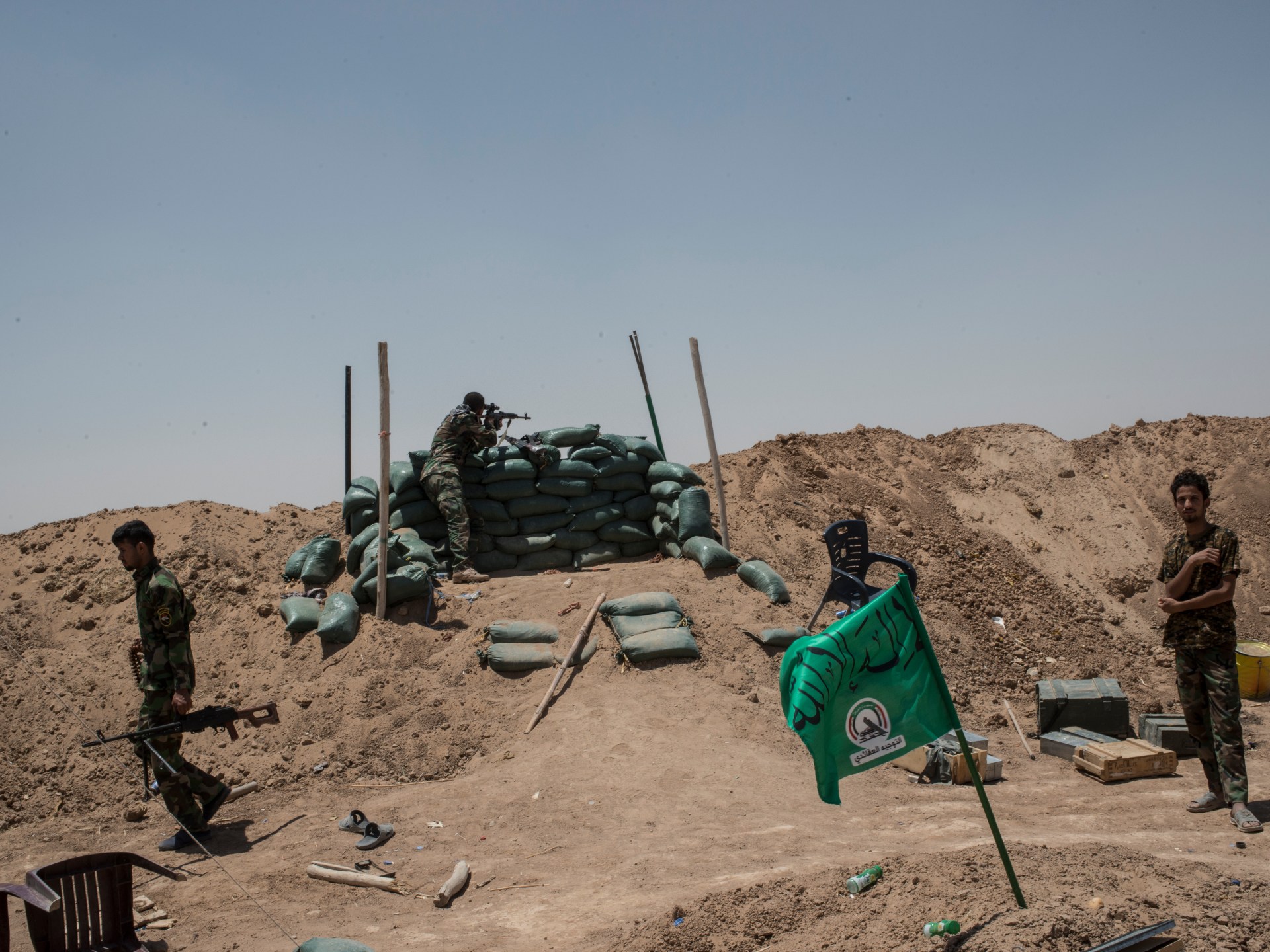 Strikes kill two PMF fighters in northern Iraq amid wider war, group says