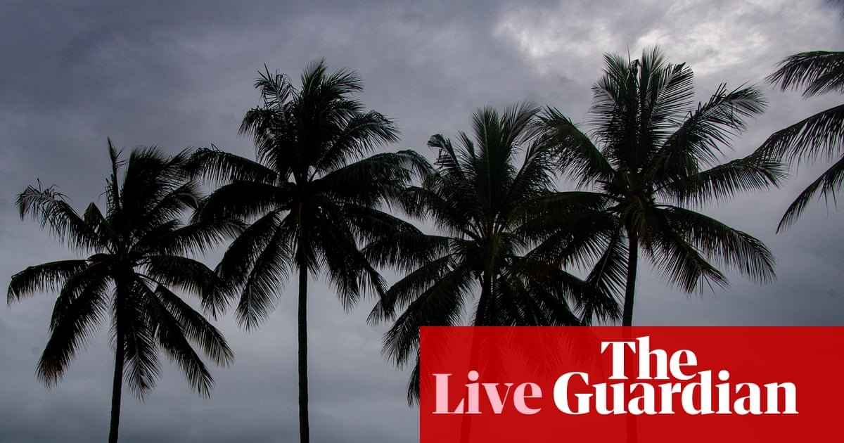 Australia news live: Tropical Cyclone Narelle dips below category-five strength hours before hitting Queensland coast