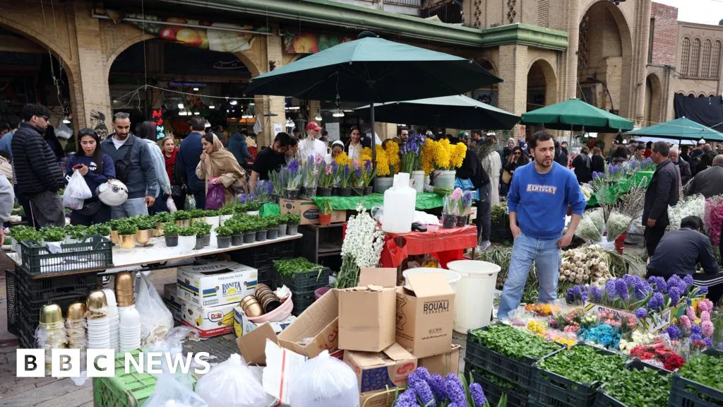 Iranians prepare for Persian new year under shadow of war