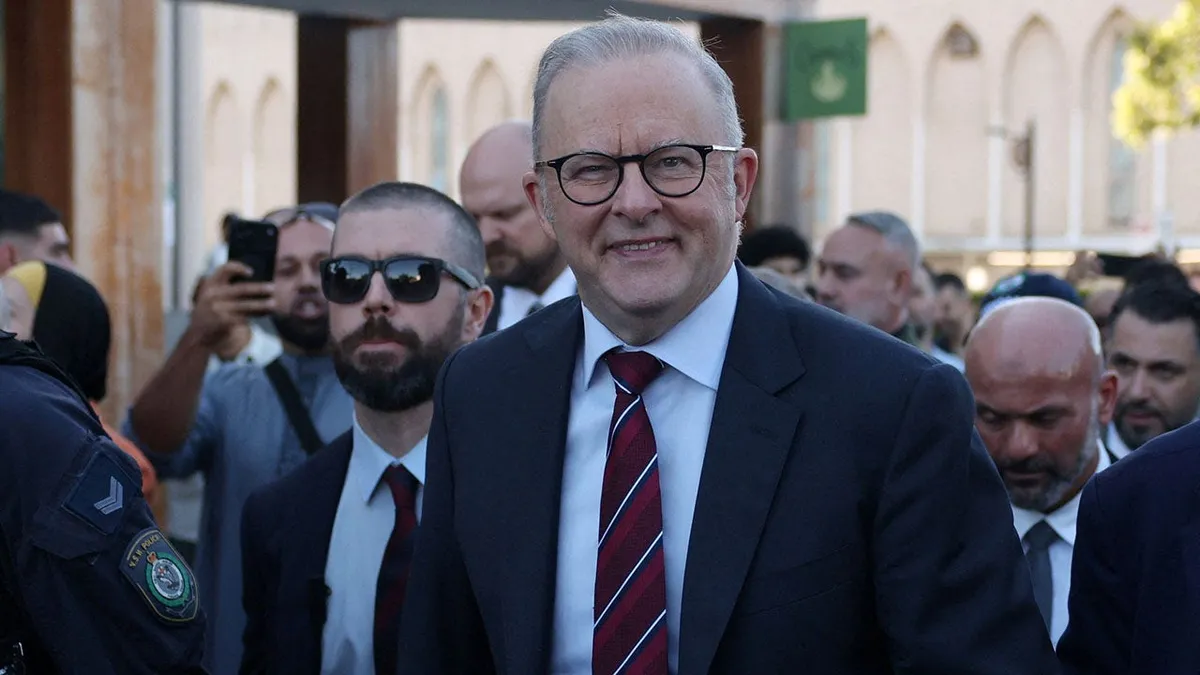 Australian prime minister heckled at mosque, called 'putrid dog' by protestors