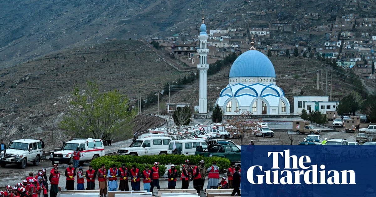 ‘This is the saddest moment’: families search for loved ones on Eid after Kabul hospital strike