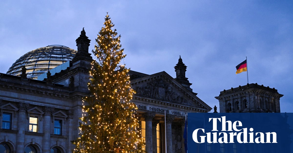 Member of far-right AfD party charged with making Nazi salute at Reichstag