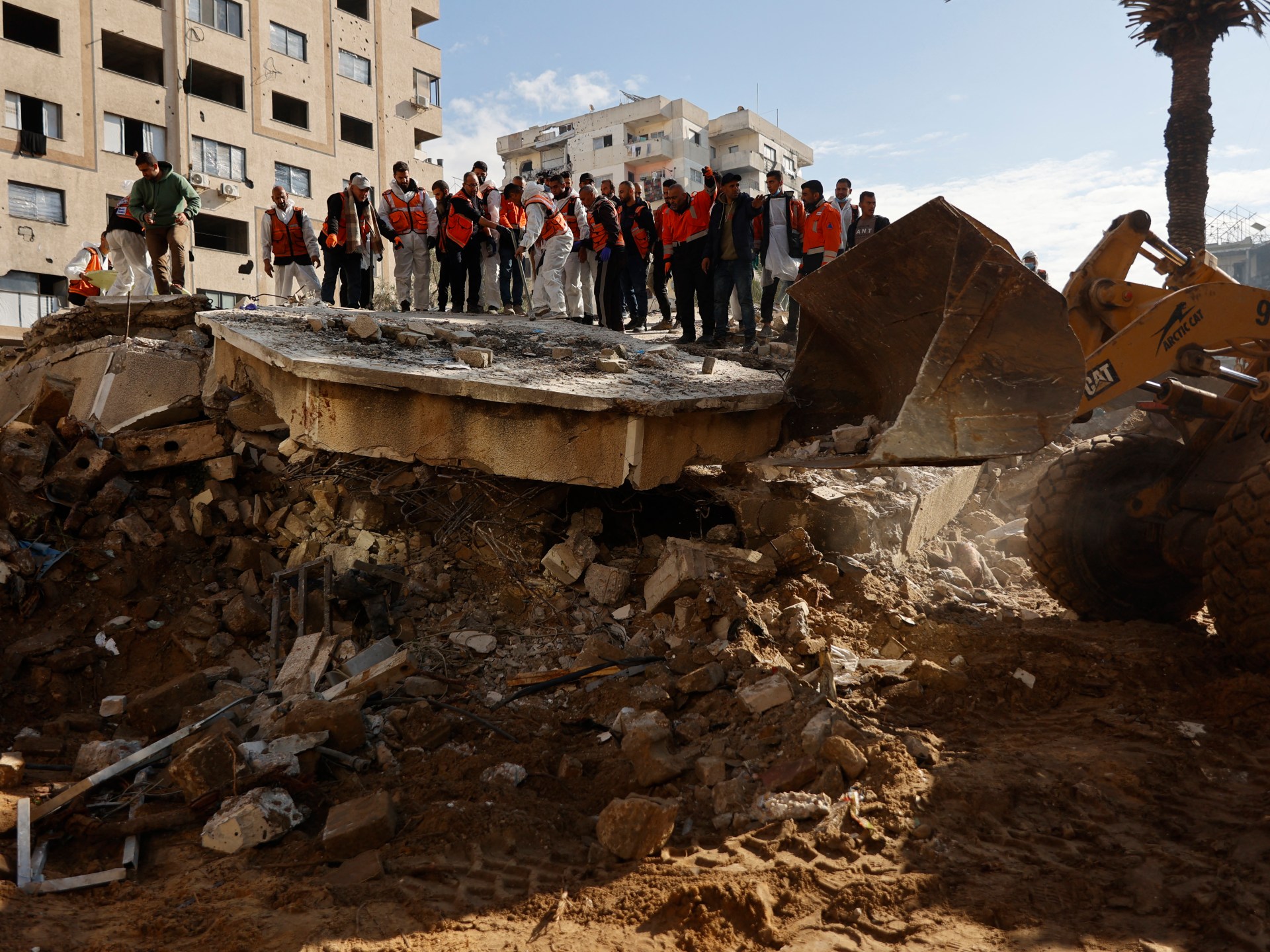 Gaza authorities struggle to recover bodies from rubble amid winter storms